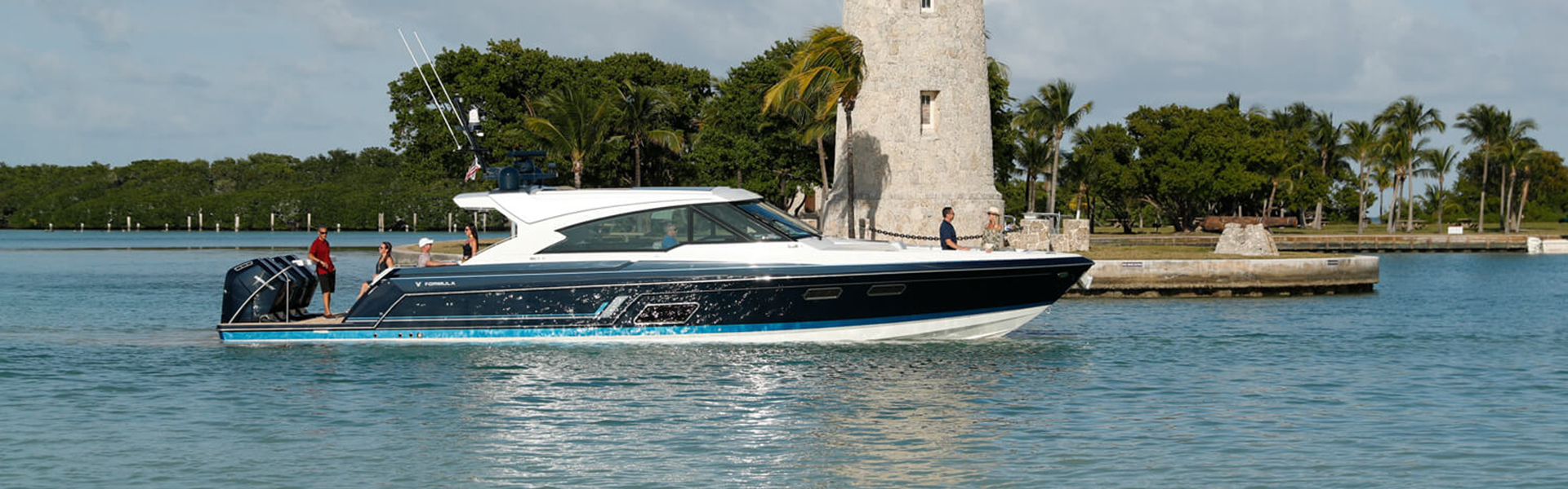 Boat slide 4: Formula Boat sitting on the water