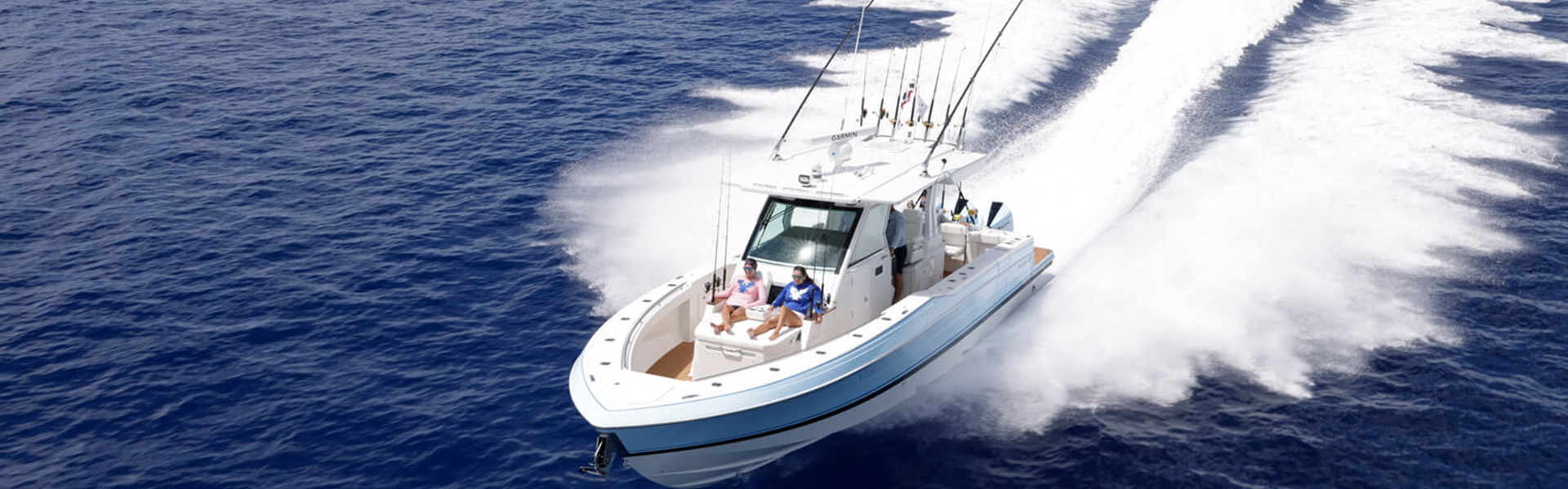 Boat slide 5: Formula Center Console Boat racing through the water